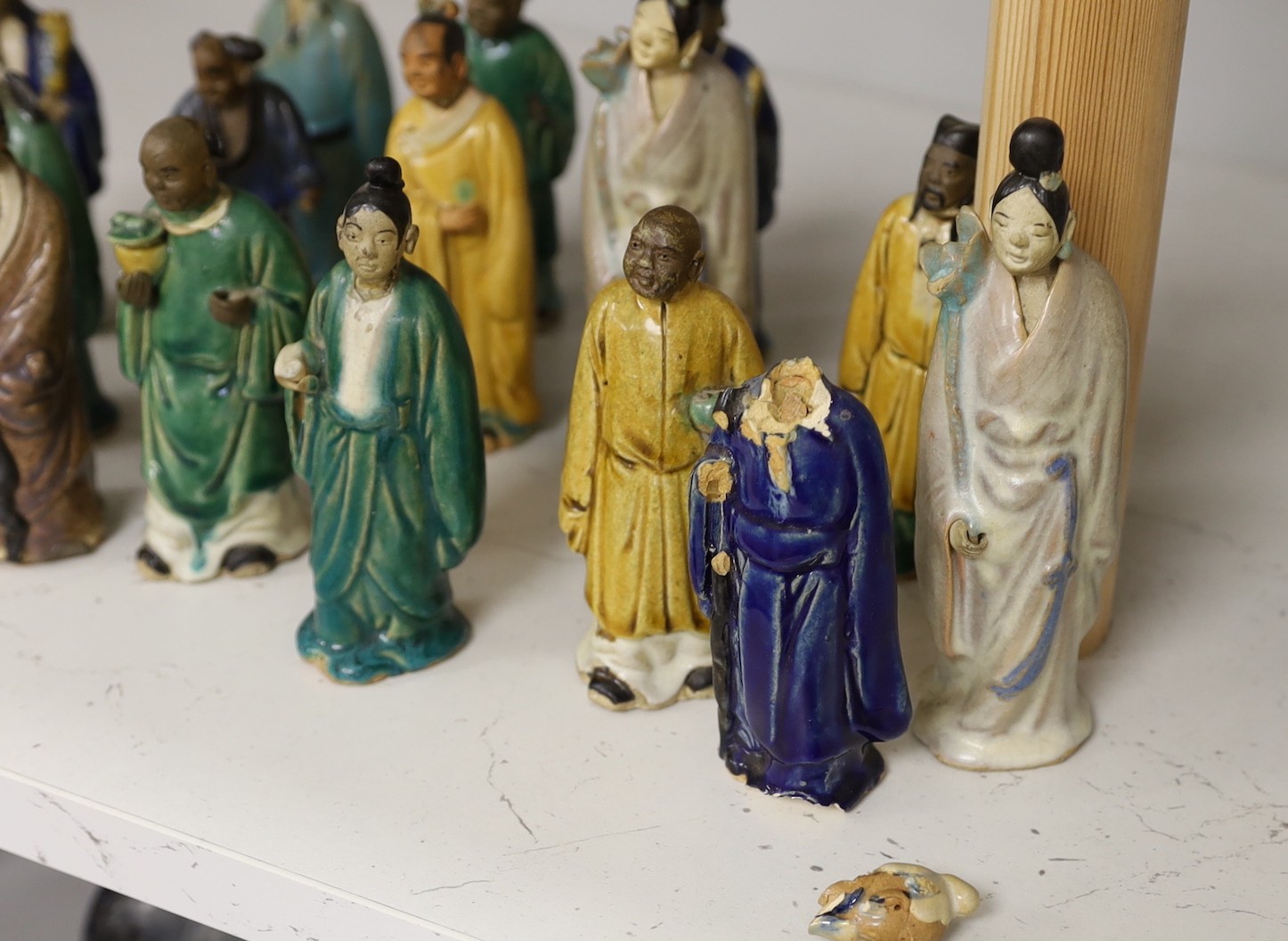 Fifteen Chinese Shiwan type glazed pottery figures, early 20th century, tallest 15cm
